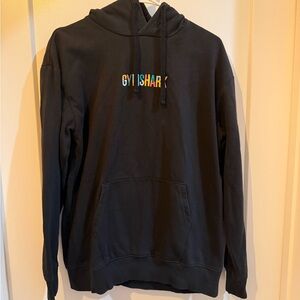 Gymshark Men's Black Hoodie with Colorful Logo